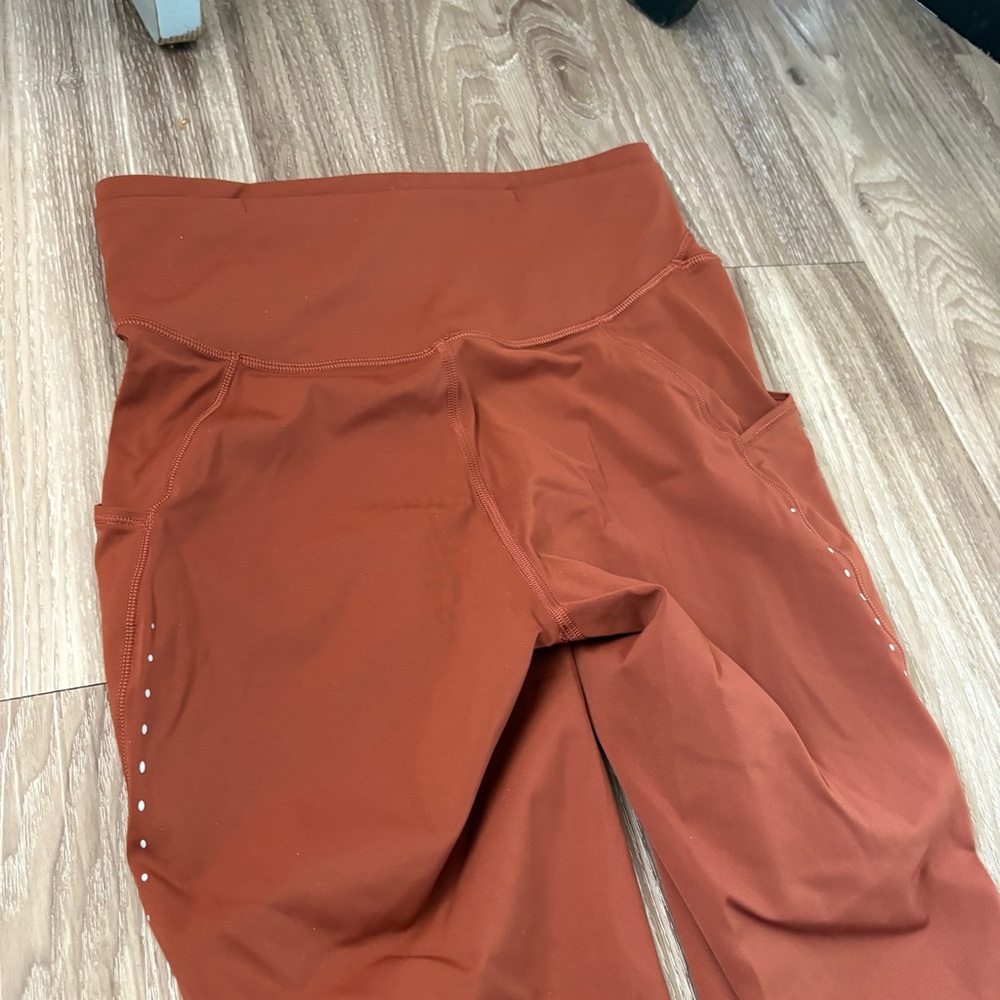 SOLD ***Lululemon Fast and free high rise tight leggings. Color Dark terracotta - Picture 4 of 11